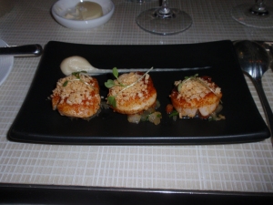 Sautéed sea scallops with chorizo, orange and white onion compote